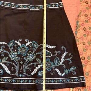 Heart & Soul embroidered mini skirt. Size 28” waist. Length is 19” long.